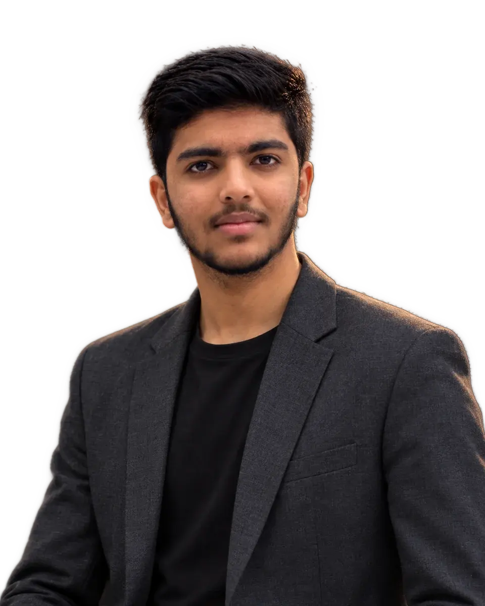 Azan Akram in a charcoal blazer over a black t-shirt